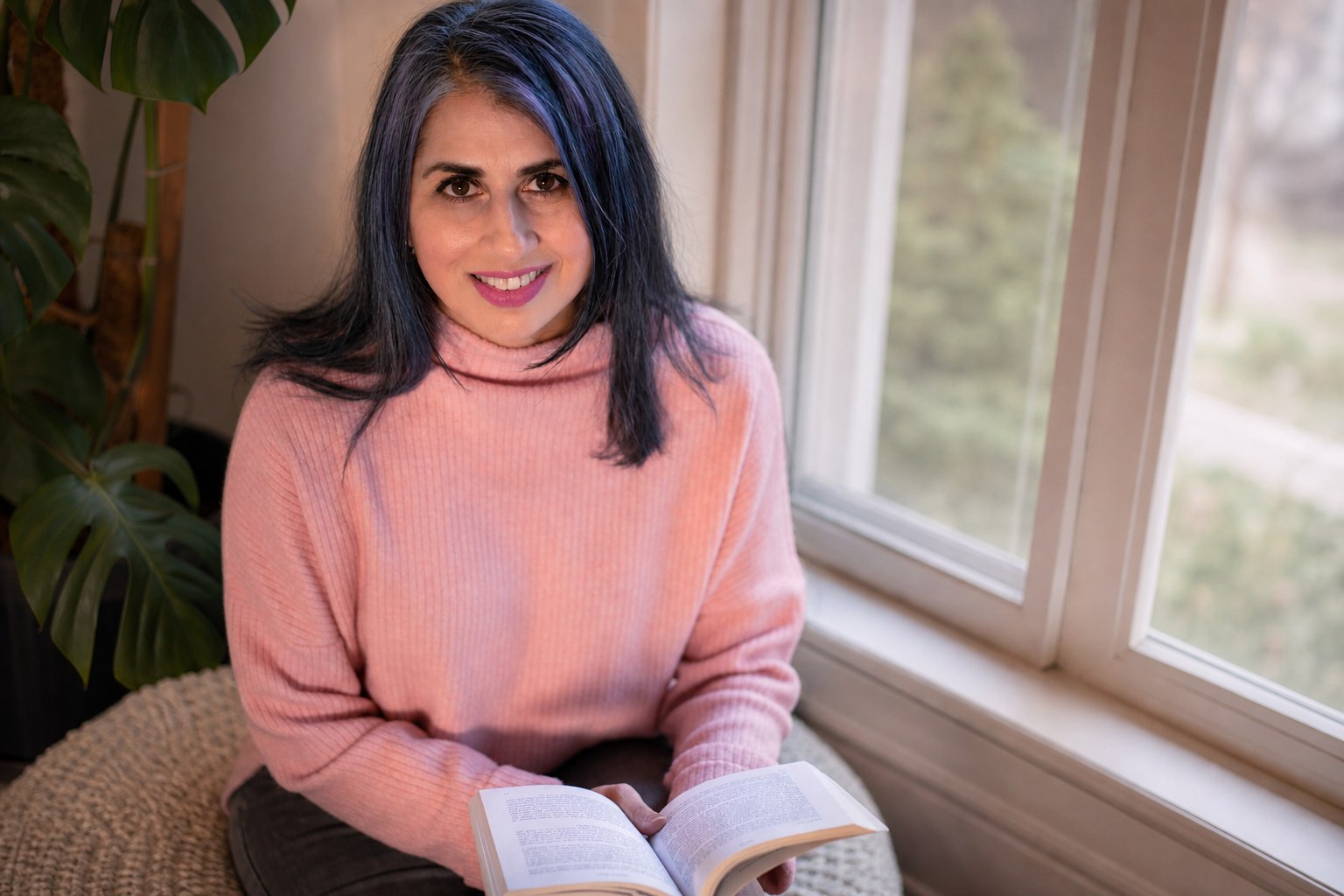 Parminder Thind reading a book